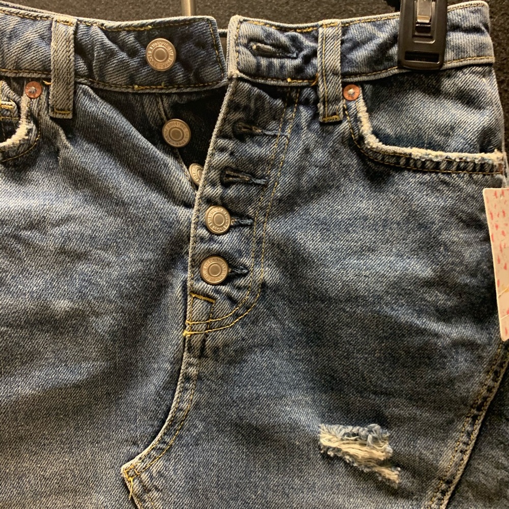 FREE PEOPLE
Destroyed Button Denim Skirt In Harvey - Picture 10 of 15